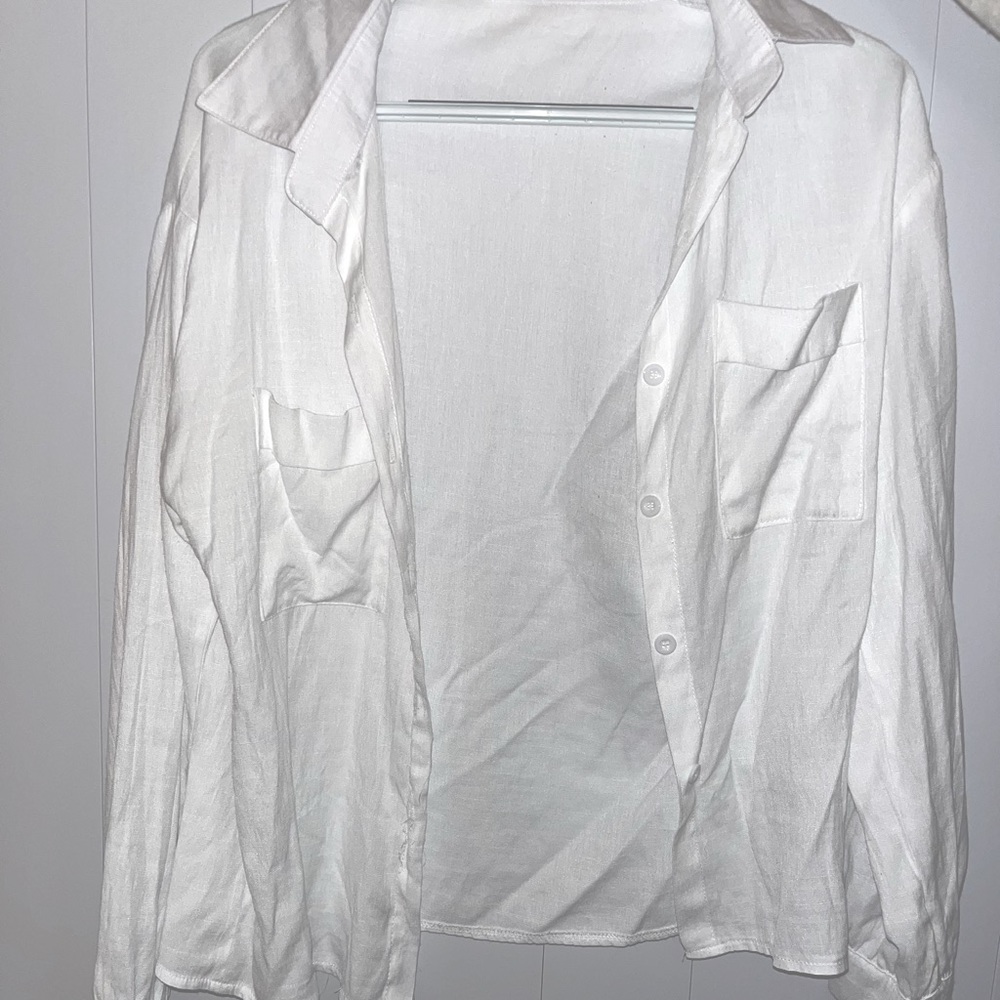 A white button up, super cute for sweater vests!!